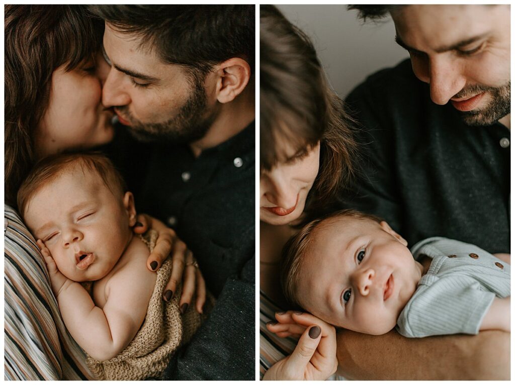 sleeping newborn baby in his parents arms.