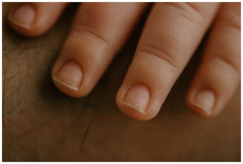 macro finger shot of newborn 